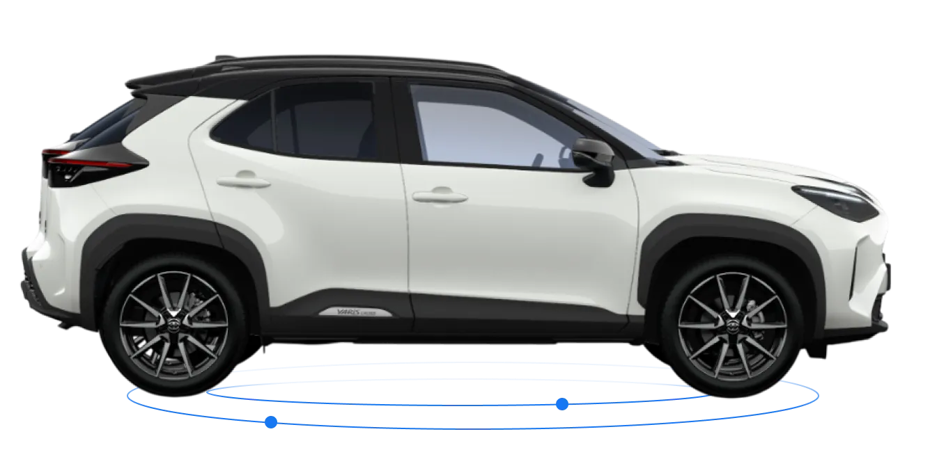 Une Toyota Yaris Cross blanche de profil